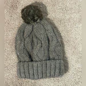 Knitted beanie with pom pom